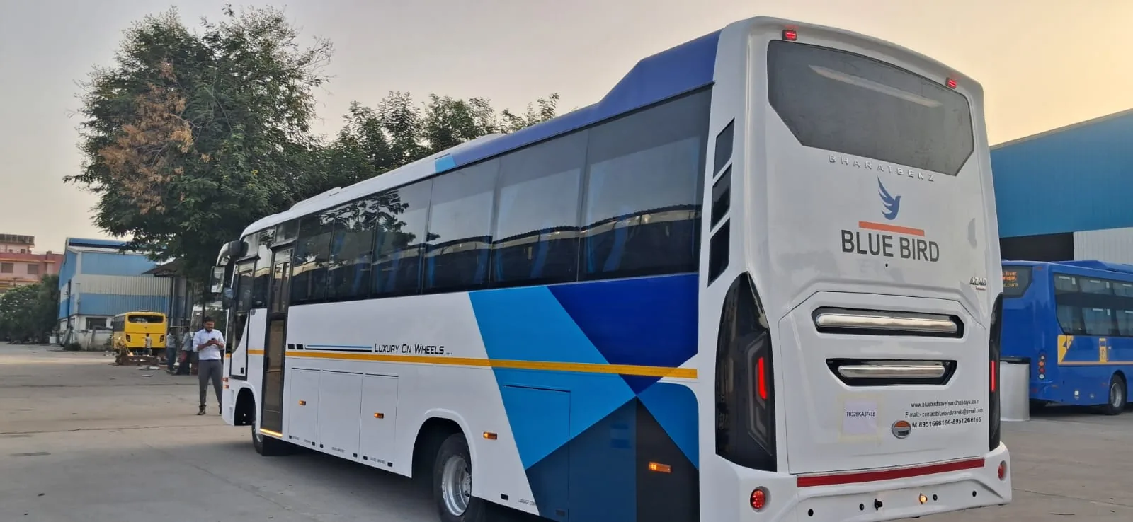 Blue Bird coach at sunset